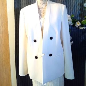 Office jacket made by Tahari, size 16, color is cream